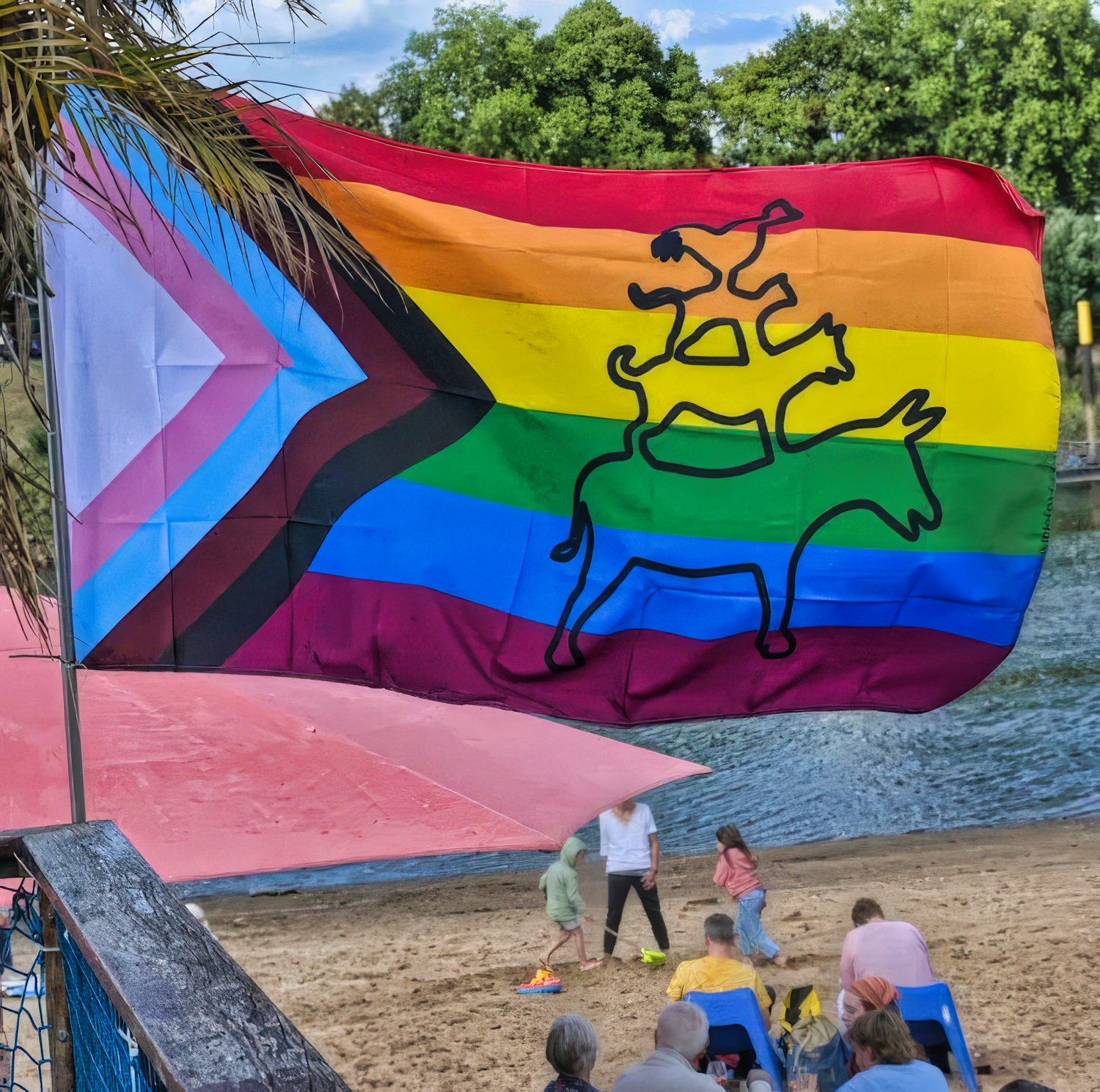 auf dem bild ist die CSD Bremen pride flagge zusehen. mit den muster der bremer stadtmusikanten